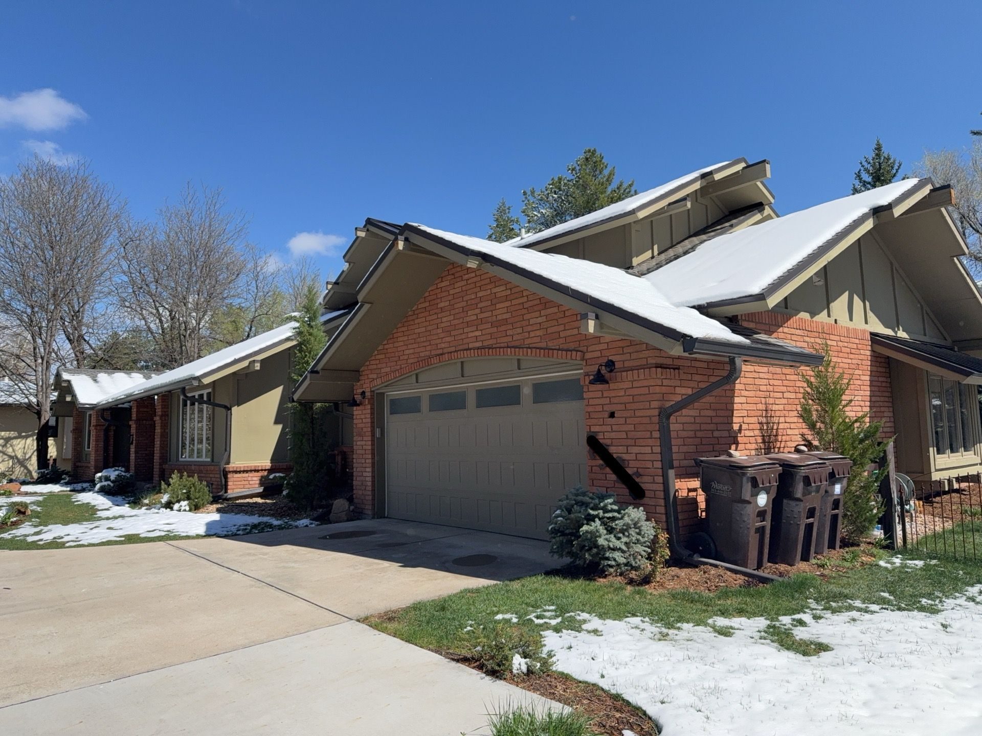 Original brick exterior of Boulder CO home before transformation