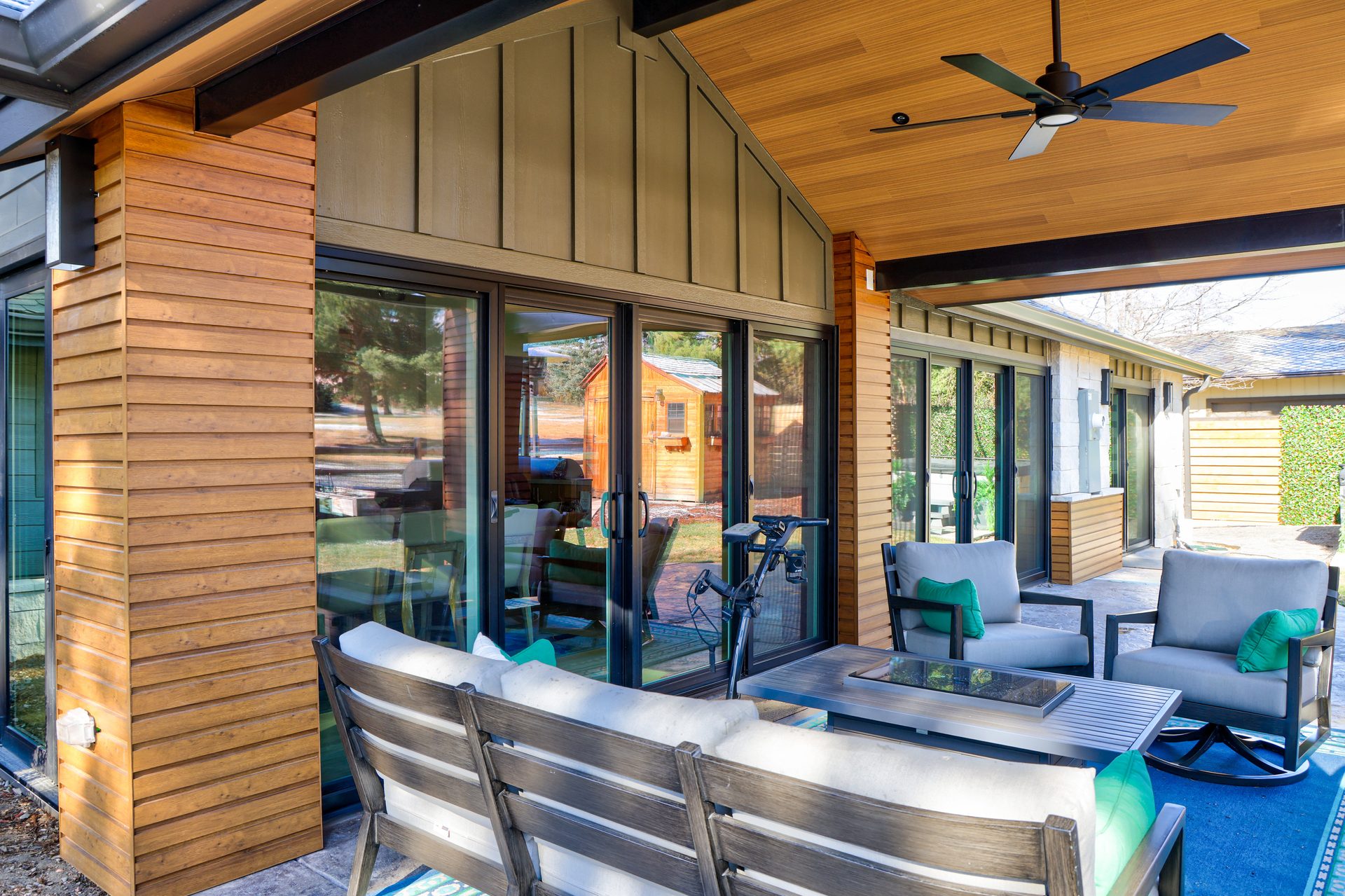New Pella bi-fold patio doors opening to covered back patio, Boulder CO
