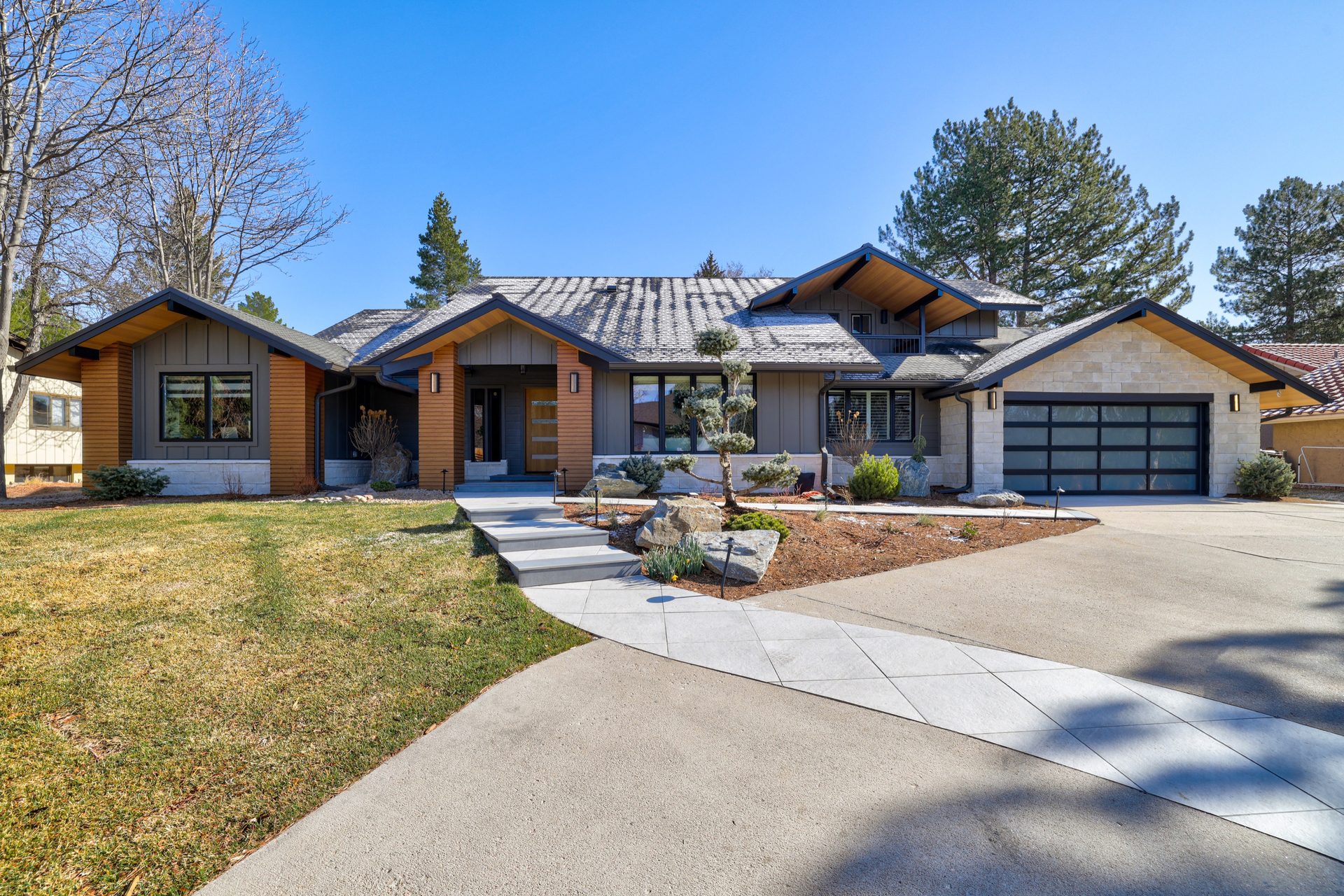 AlumLA columns with horizontal slatted wraps at the main entry, Boulder CO