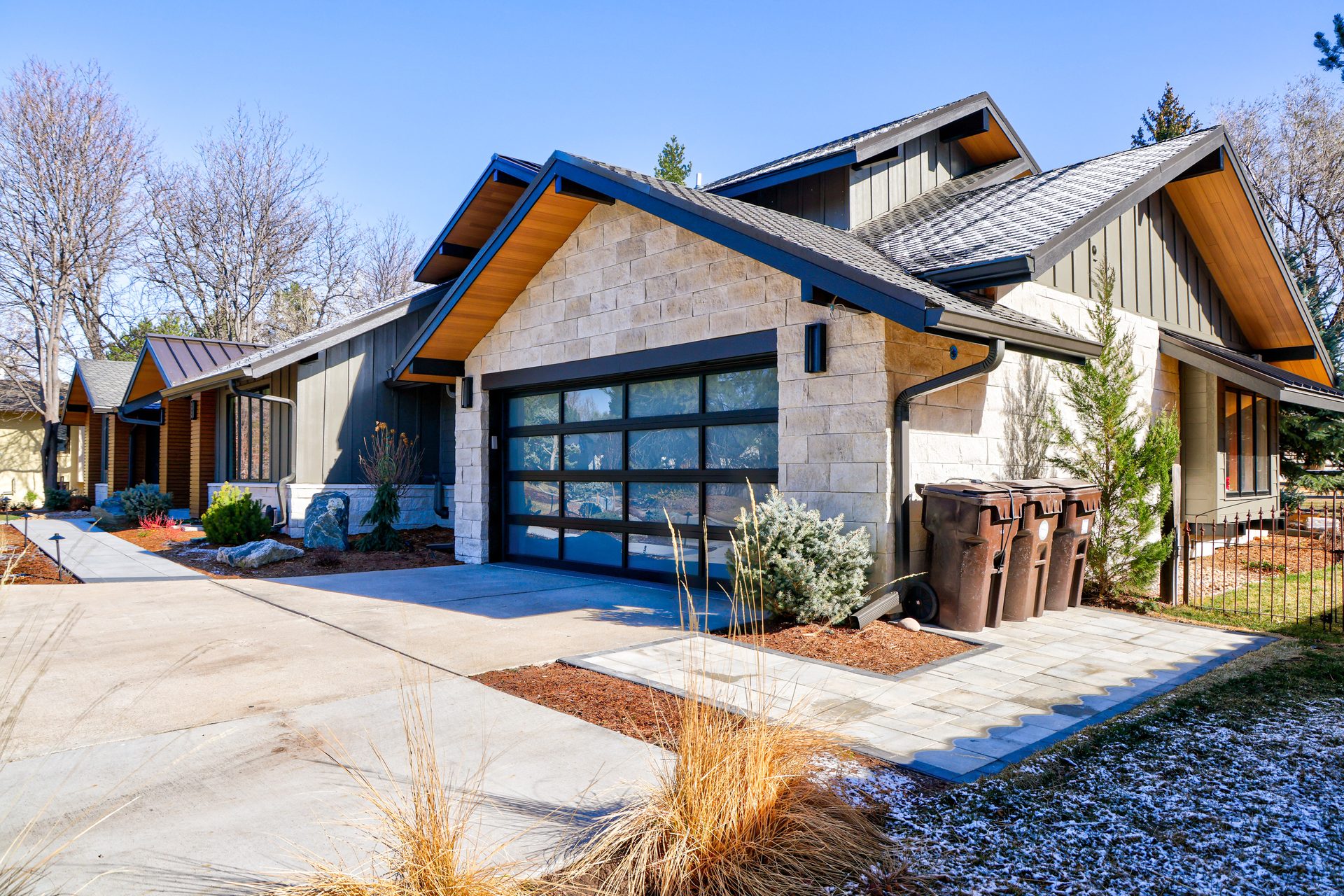 James Hardie siding and El Dorado stone veneer facade with new full-window garage door, Boulder CO
